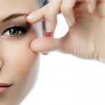 Woman Holding Open Eye Tired Eyes Beauty Skincare Advice