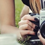 blonde-woman-taking-photos-with-a-professional-camera_1280x960 feature