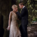 Leonardo DiCaprio in the Great Gatsby with woman in creme sequined Flapper Dress