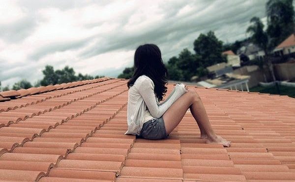 Alone-girl-on-roof woman home improvement