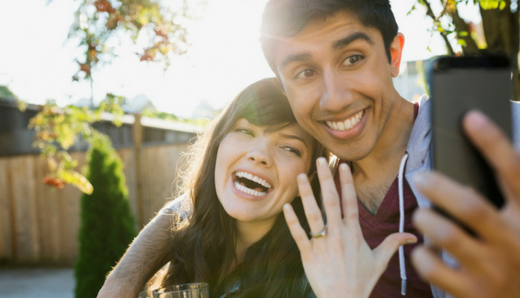 Millennial couple diamond selfie