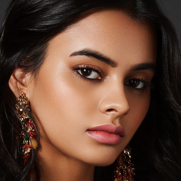 night face makeup big earrings Indian woman