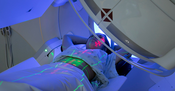 woman getting MRI catscan radiation
