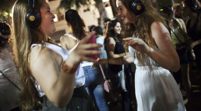 young women dance fitness headphones