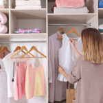 woman-organizing-closet