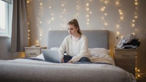 girl on bed young bedroom lights