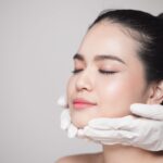 young asian woman skincare routine aging