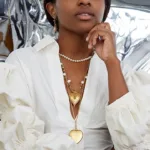 Jewelry gold heart dangling long pearl necklace puffed shirt fashion