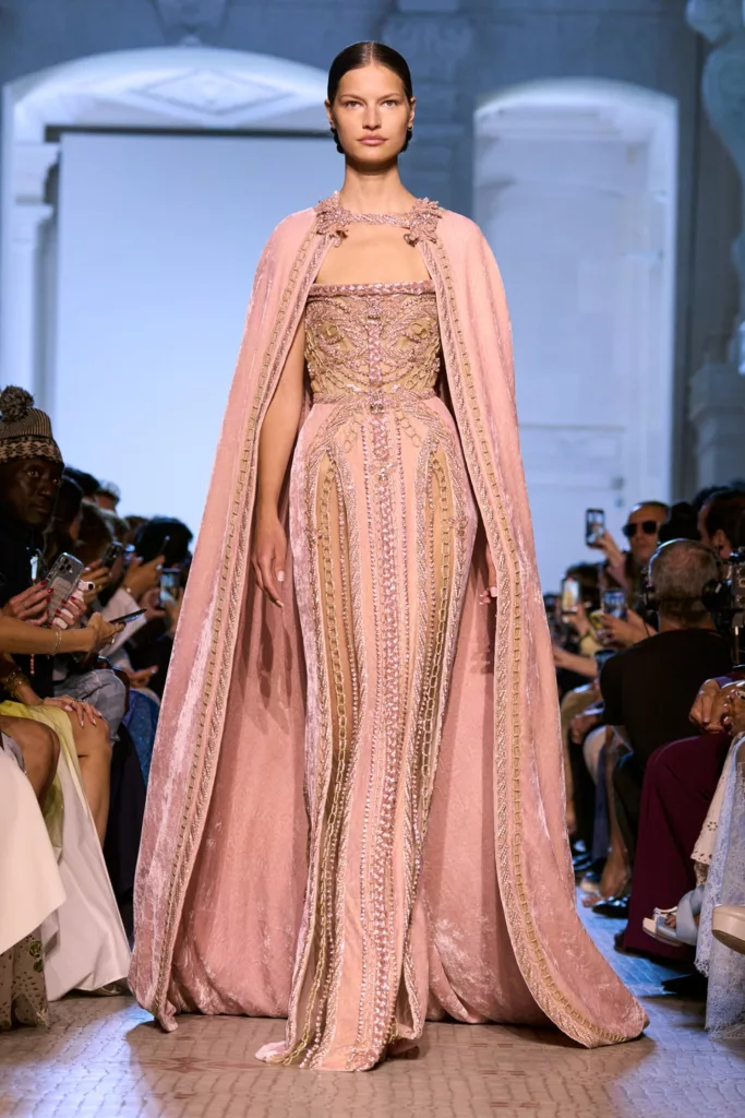 Couture Model in Cape and Light Pink Gown