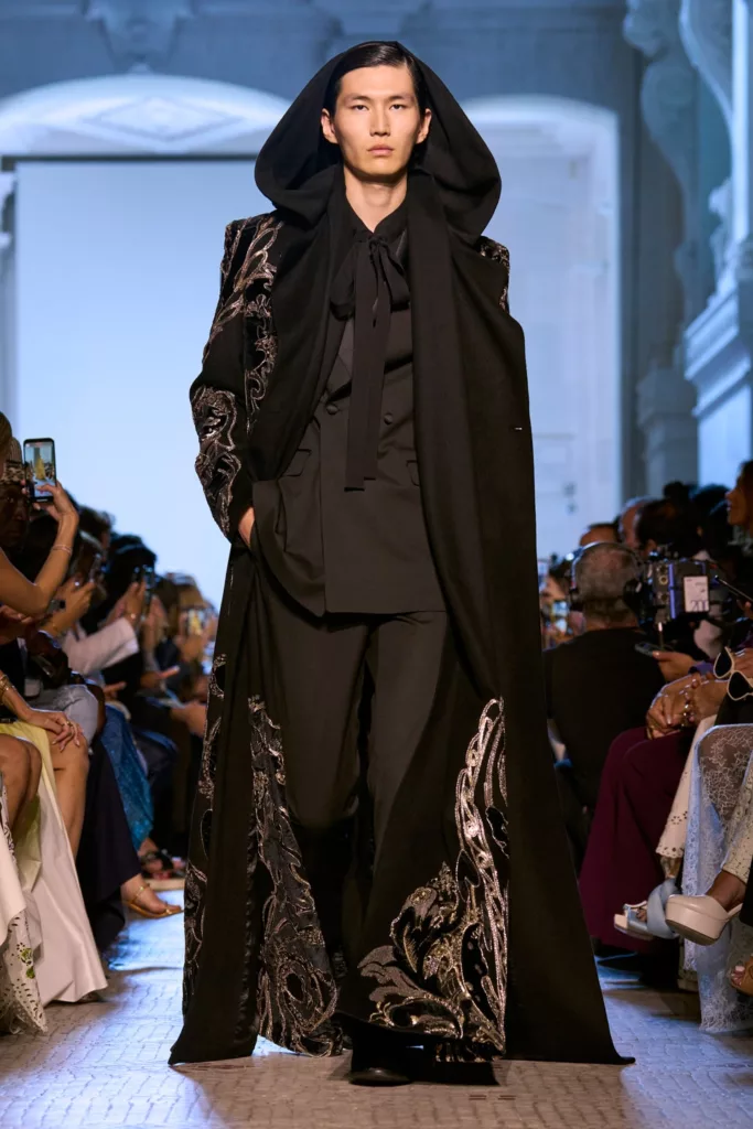 Elie Saab Fall 2023 Couture Male Model in Cape and Black Suit