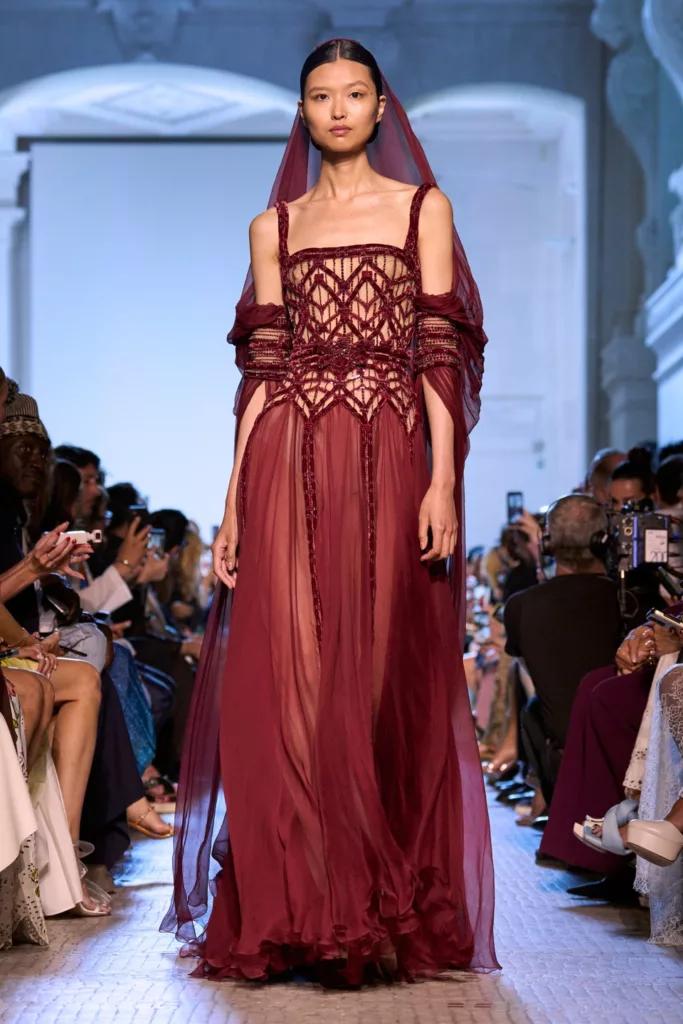Elie Saab Fall 2023 Couture Model in Veil and Red Strappy Gown
